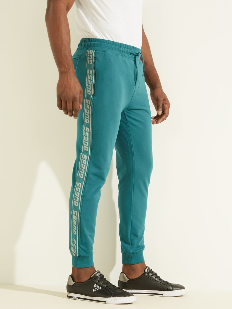 Spodnie Męskie Guess Eco Arlo Logo Tape Joggers Turkusowe | 1753690-MF